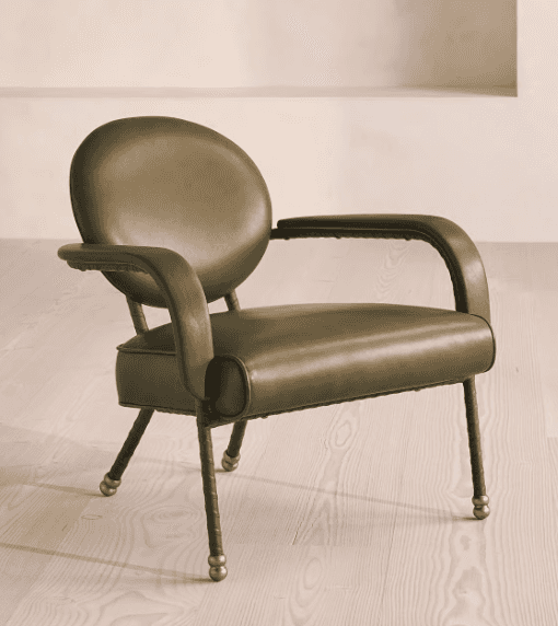 A contemporary armchair with a rounded backrest and armrests, upholstered in a muted olive-green mat… — 3D model