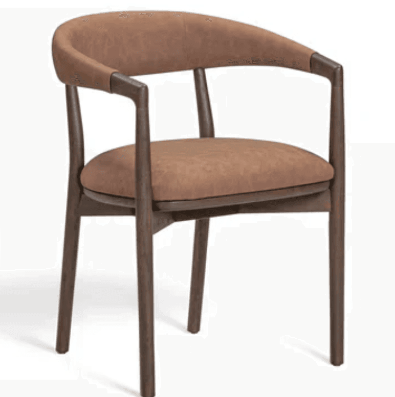 A contemporary dining armchair featuring a solid wood frame with a dark finish and a padded seat and backrest upholstered in a brown, distressed faux leather or suede material. The backrest is gently curved, extending into integrated armrests that are reinforced with a darker wood detail where they meet the frame. The legs are straight and slightly tapered, with a subtle splay in the rear. — 3D model