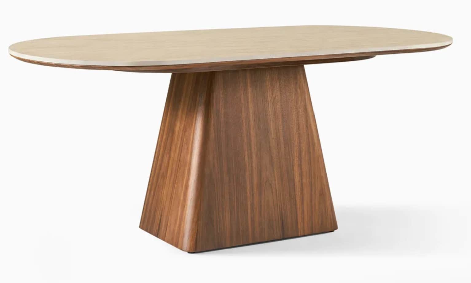 An oval-shaped dining table featuring a light-colored, possibly stone or composite, tabletop with ro… — 3D model
