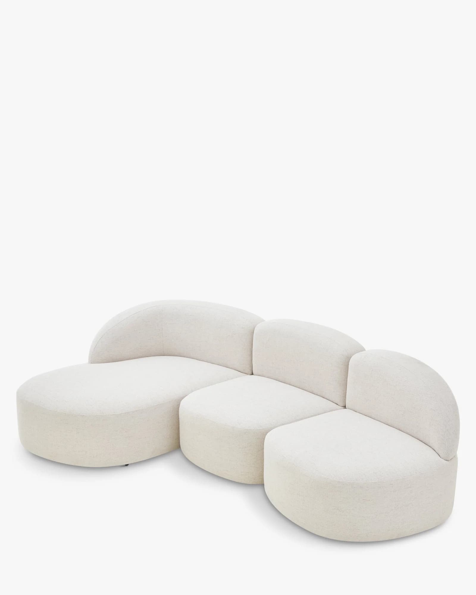 A modular sectional sofa composed of rounded, curved modules. The sofa features a low profile and appears to be upholstered in a textured fabric. The overall design is organic and contemporary, with no visible legs, giving it a floating appearance. — 3D model