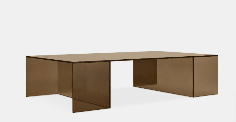 A rectangular coffee table made entirely of tinted, smoked brown glass or acrylic, featuring a minimalist design with a flat top surface and two U-shaped leg supports. — 3D model
