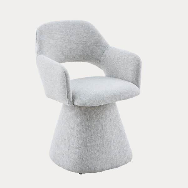 A contemporary light grey upholstered chair featuring a rounded backrest, integrated armrests, and a… — 3D model