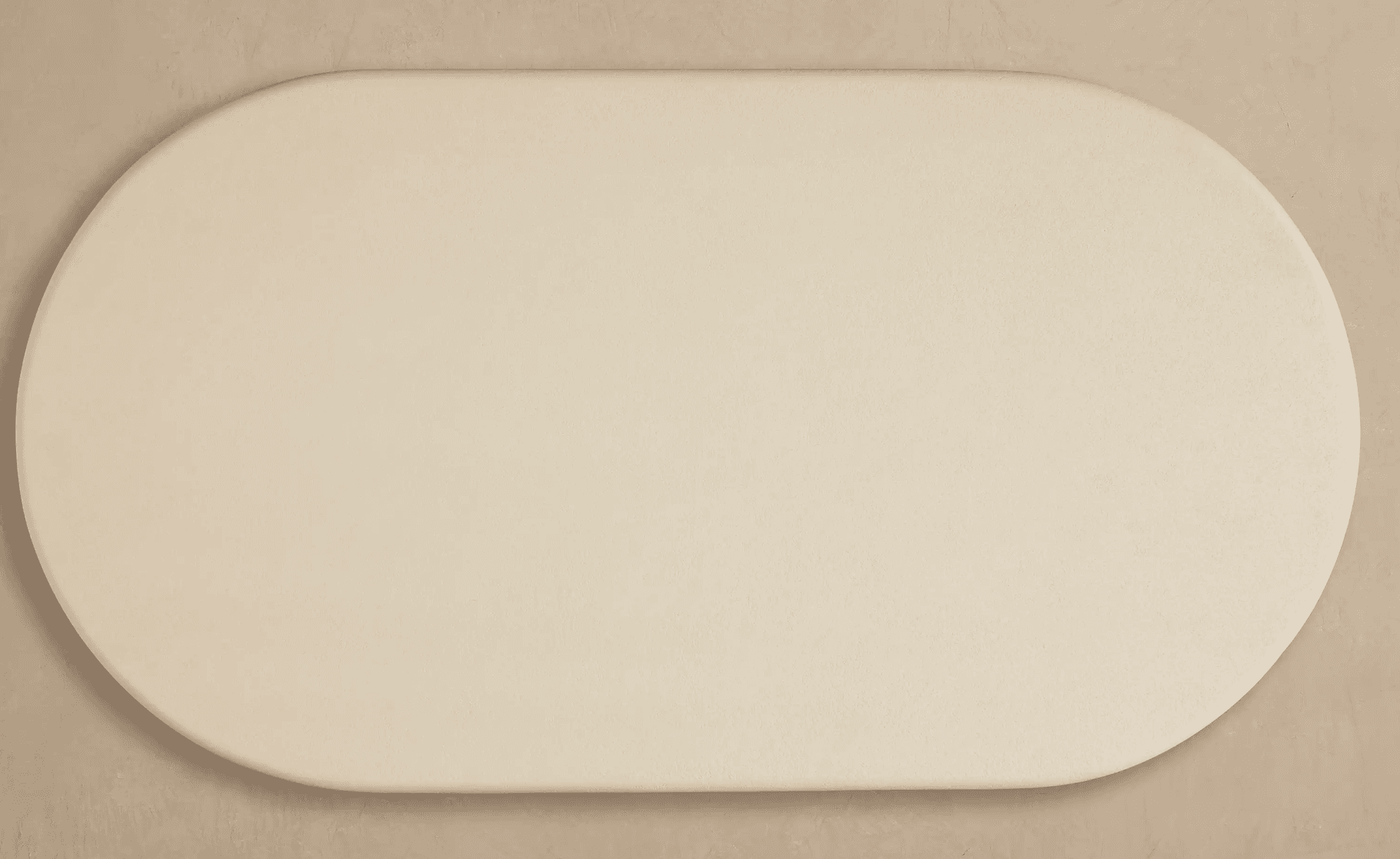 A cream-colored, oval-shaped decorative panel with a smooth, matte finish and softly rounded edges, presented against a subtly textured beige background. The object has a uniform thickness and a minimalist aesthetic. — 3D model