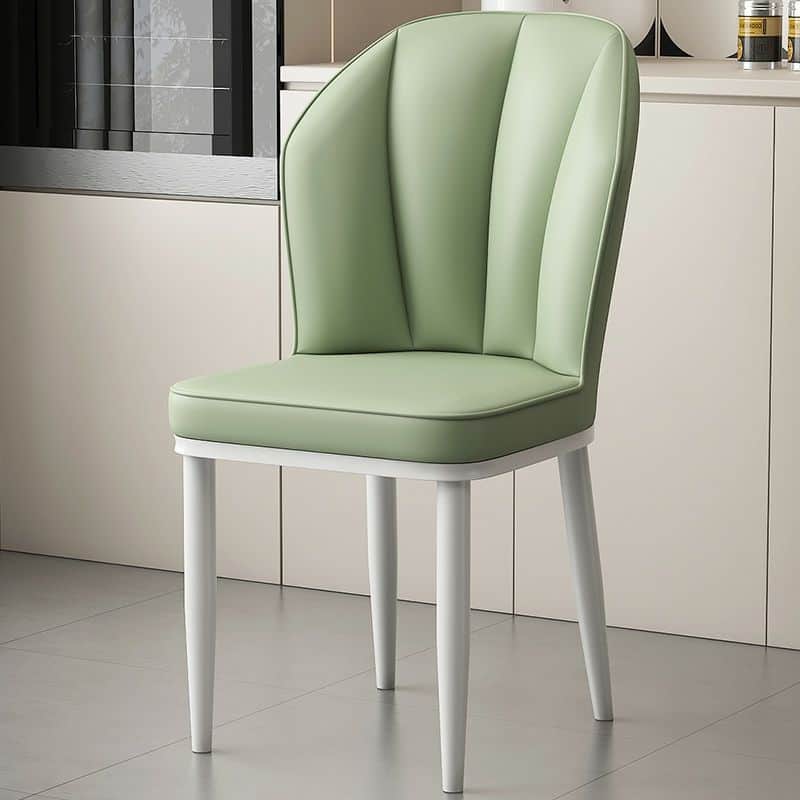 A modern upholstered dining chair with a distinctive scalloped backrest and tapered white legs. The… — free GLB 3D model