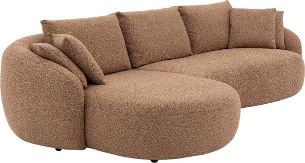 A contemporary, curved sectional sofa upholstered in a warm tan boucle fabric, featuring a flowing, organic silhouette and loose back cushions. — 3D model