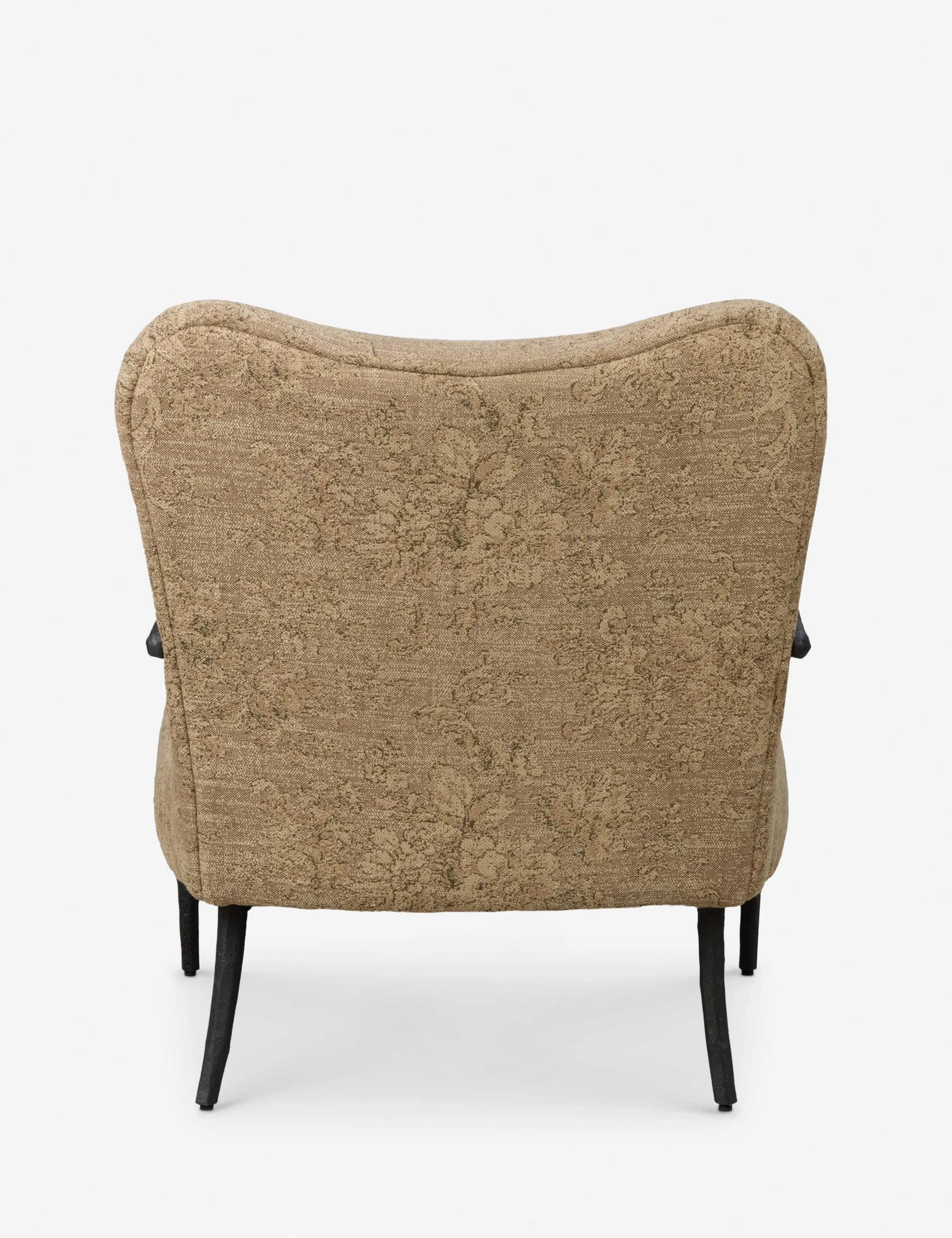 An upholstered accent armchair featuring a high, slightly curved backrest. The chair is covered in a… — free SKP 3D model
