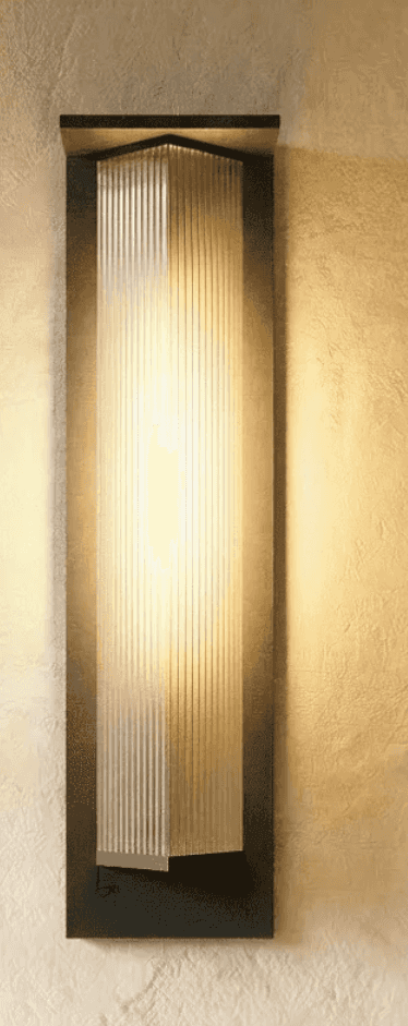 A tall, rectangular wall-mounted light fixture featuring a dark-toned metal backplate and a prominen… — free GLB 3D model
