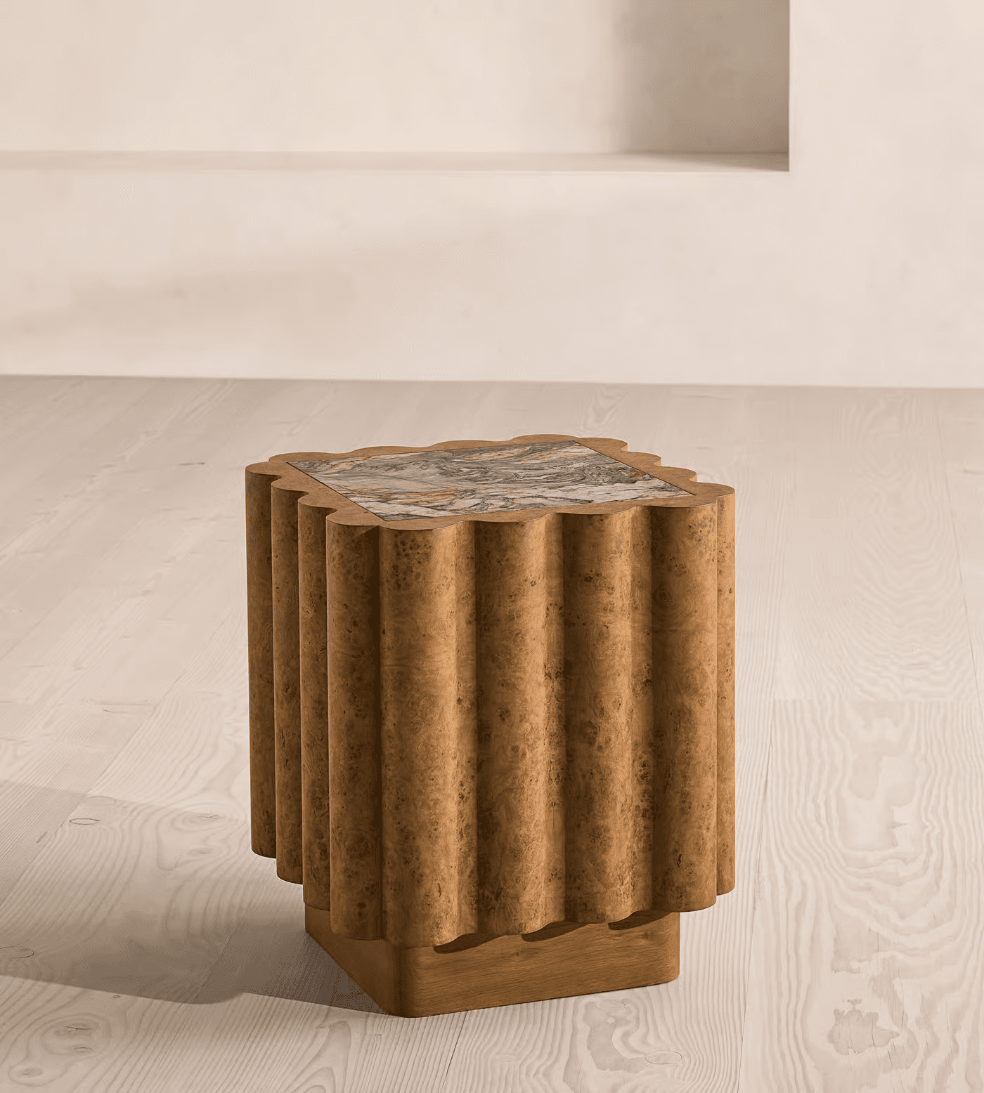 A fluted end table with a burl wood finish and a marble top. The base is rectangular and made of wood, supporting a cylindrical body with vertical fluting. The top surface is irregularly shaped and features a polished marble slab with natural veining in shades of pink, green, and brown. — 3D model