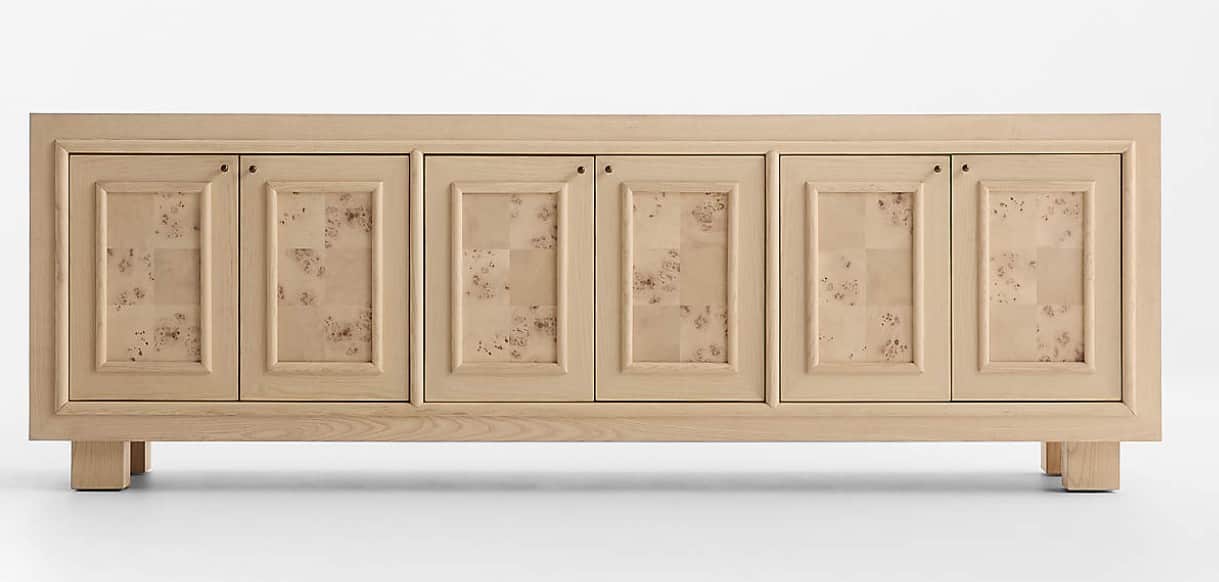A modern sideboard featuring a light-toned wooden frame and four cabinet doors. Each door has a rece… — 3D model