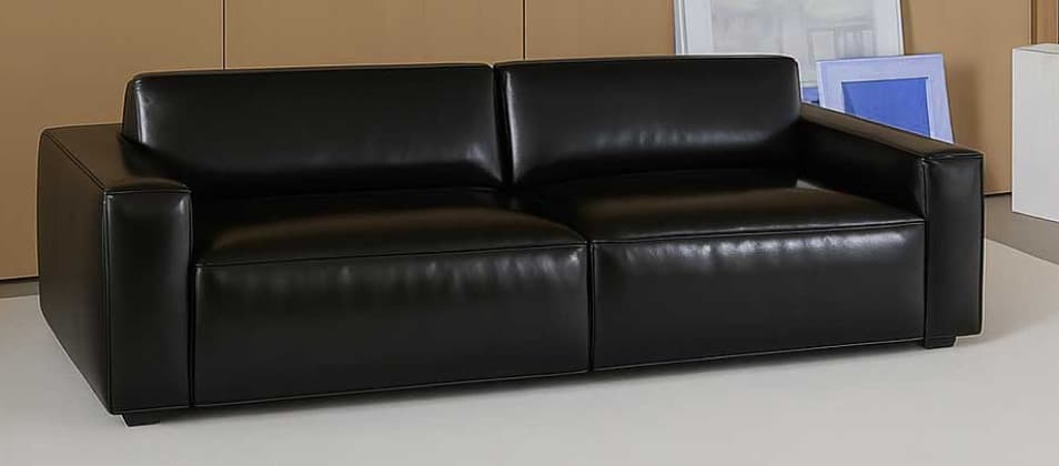 A contemporary two-seater sofa upholstered in black leather or faux leather, featuring a minimalist design with clean lines. It has squared armrests, two distinct seat cushions, and two back cushions, all presenting a smooth, unadorned surface. The sofa sits low to the ground on what appear to be short, recessed block feet, contributing to its modern aesthetic. — 3D model