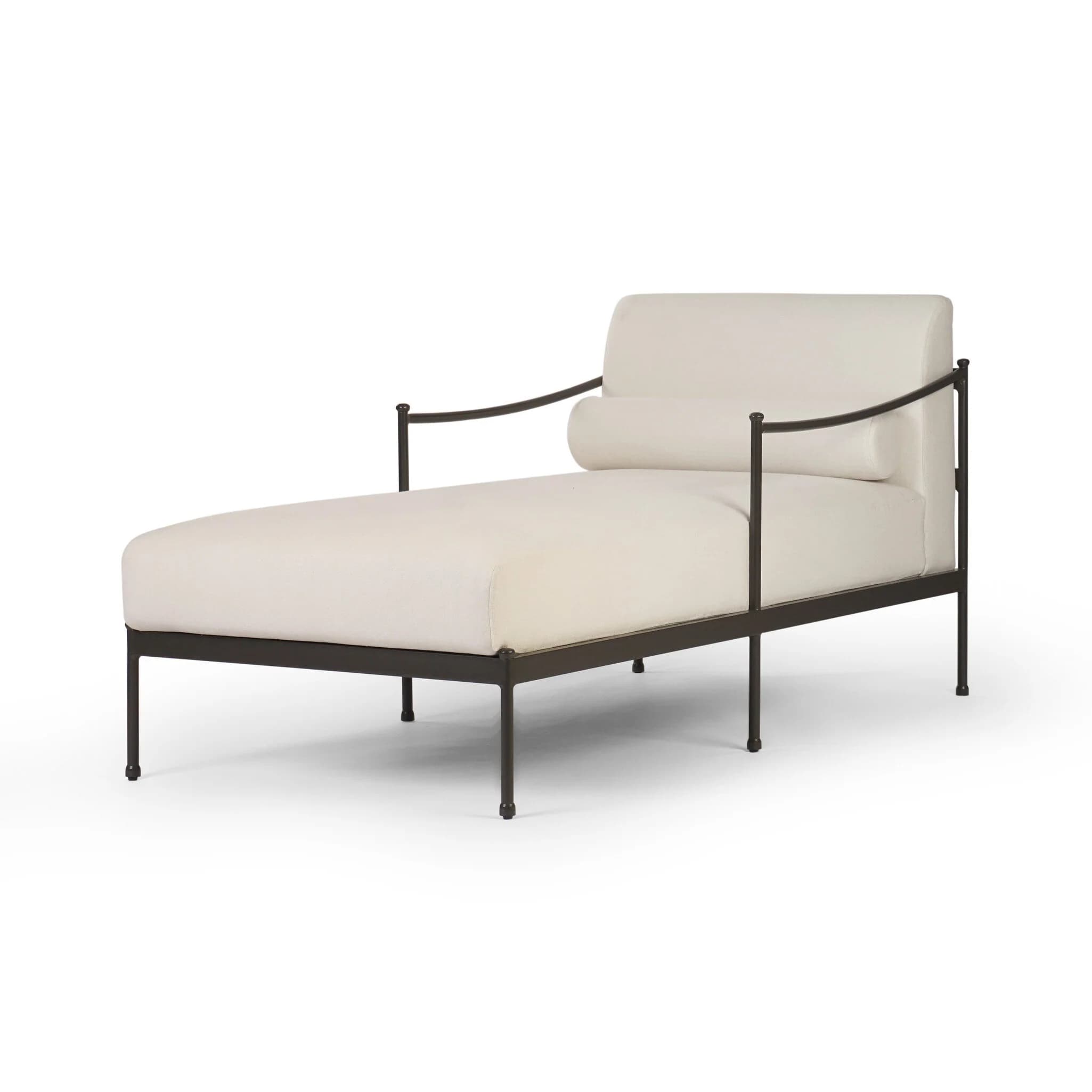 A modern chaise lounge with a dark metal frame and a light-colored upholstered seat and backrest. The chaise features slender, angled legs, curved armrests that extend from the frame, and a cylindrical bolster pillow positioned at the headrest area. — 3D model