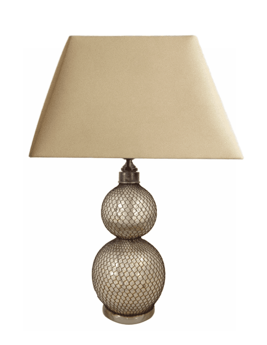 A table lamp featuring a double gourd-shaped base, intricately covered with capiz shell pieces enclosed within a dark wire mesh. The base sits on a circular metal foot and is topped with a neutral, trapezoidal fabric lampshade. — 3D model