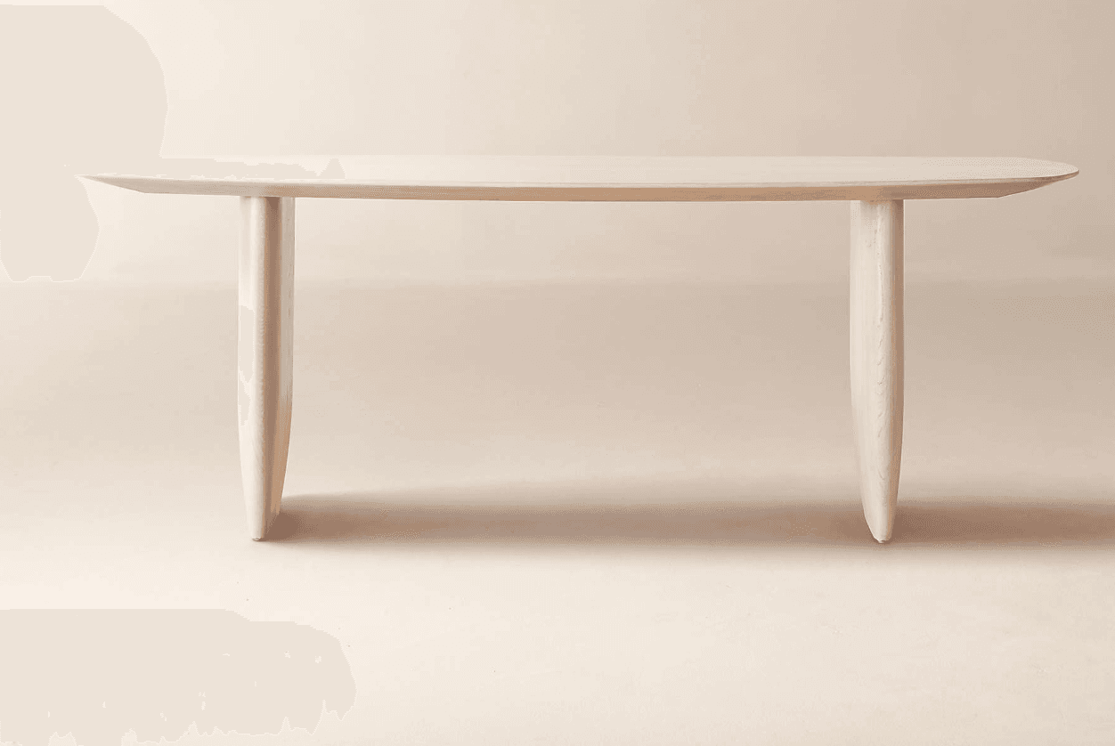 A minimalist console table featuring an elongated oval tabletop supported by two thick, sculptural, rounded legs. The entire piece is crafted from light-toned wood with a smooth, matte finish, giving it an organic and contemporary aesthetic. The design is simple, emphasizing natural forms and materials. — 3D model