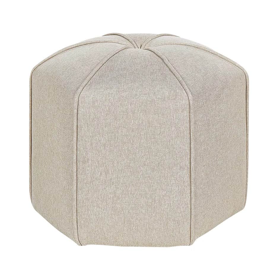 An upholstered hexagonal ottoman featuring a light beige fabric finish. The top surface has radiatin… — 3D model