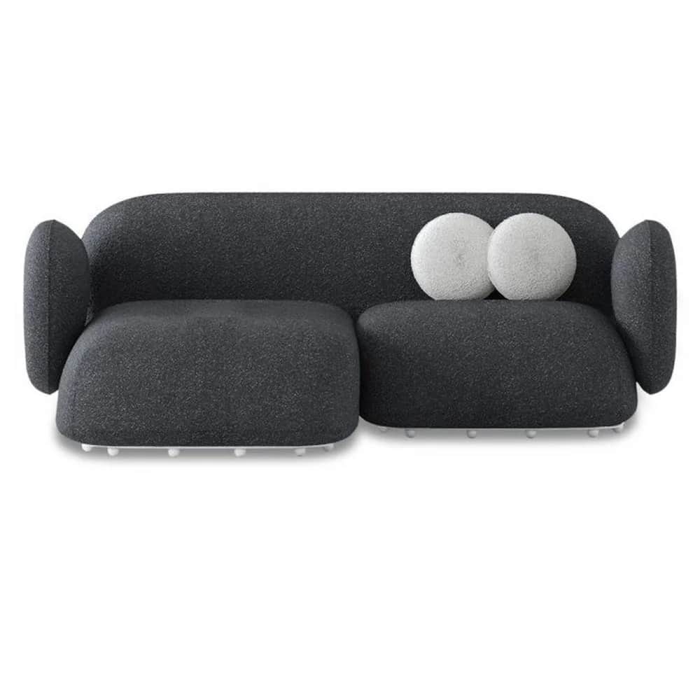 A contemporary two-seater sofa featuring soft, organic lines and a modular appearance. It is upholst… — 3D model