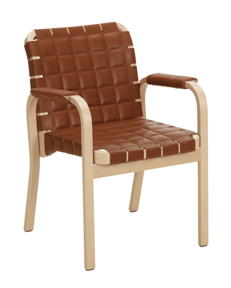 An armchair constructed with a light-toned bentwood frame and featuring woven, quilted brown leather straps for its seat and backrest. The armrests are also wrapped in matching brown leather. The chair has a contemporary design with smooth, curved wooden elements. — 3D model
