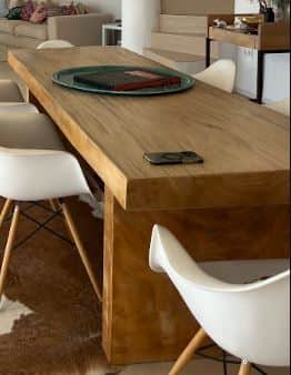 A minimalist rectangular coffee table constructed from light-colored wood. It features a simple, cle… — 3D model