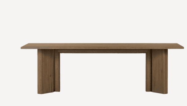 A long, rectangular dining table made of light brown wood, featuring a thick tabletop and two sturdy, rectangular block-like bases. — 3D model