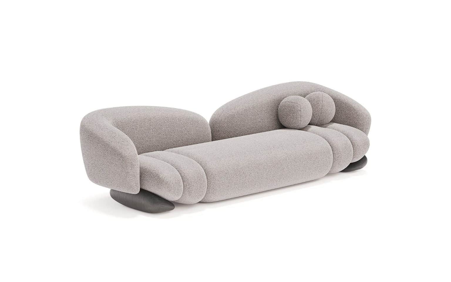 A contemporary, generously sized sofa with an organic, bulbous form. It features a low profile with… — 3D model