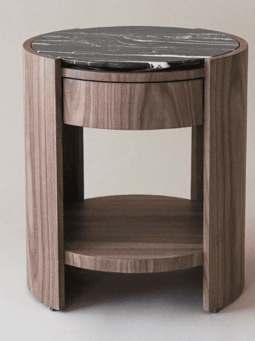 A modern round nightstand crafted from dark walnut wood with a polished black marble top. It feature… — 3D model