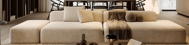 A contemporary modular L-shaped sectional sofa, upholstered in a light beige textile fabric. The sofa features a low-profile design with integrated low backrests and armrests, comprising multiple individual units arranged in an L-configuration. It is accessorized with loose back cushions, a brown patterned throw blanket, and two spherical decorative pillows, suggesting a comfortable and modern aesthetic. — 3D model