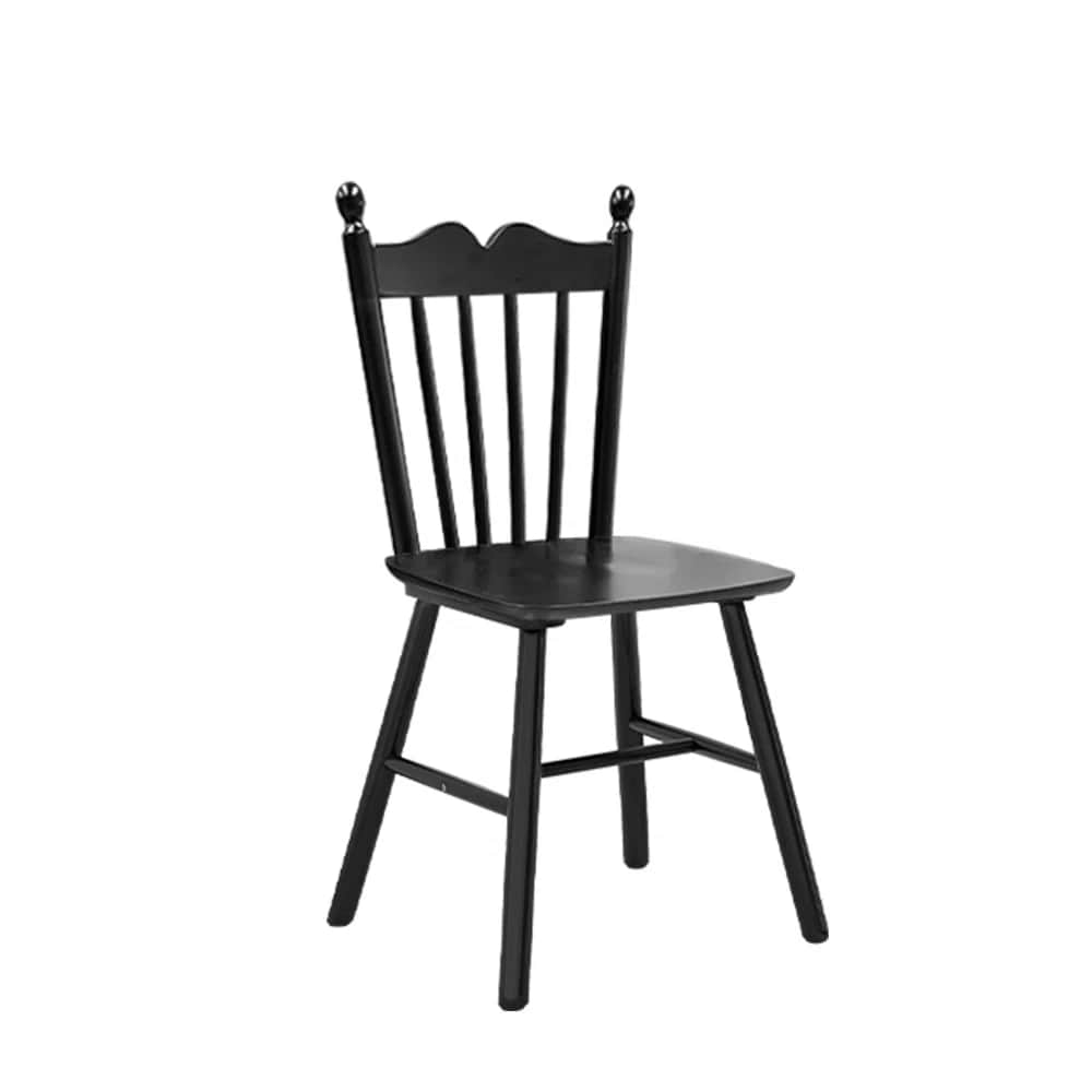 A black wooden dining chair with a spindle back and a contoured seat. The chair features a scalloped… — 3D model