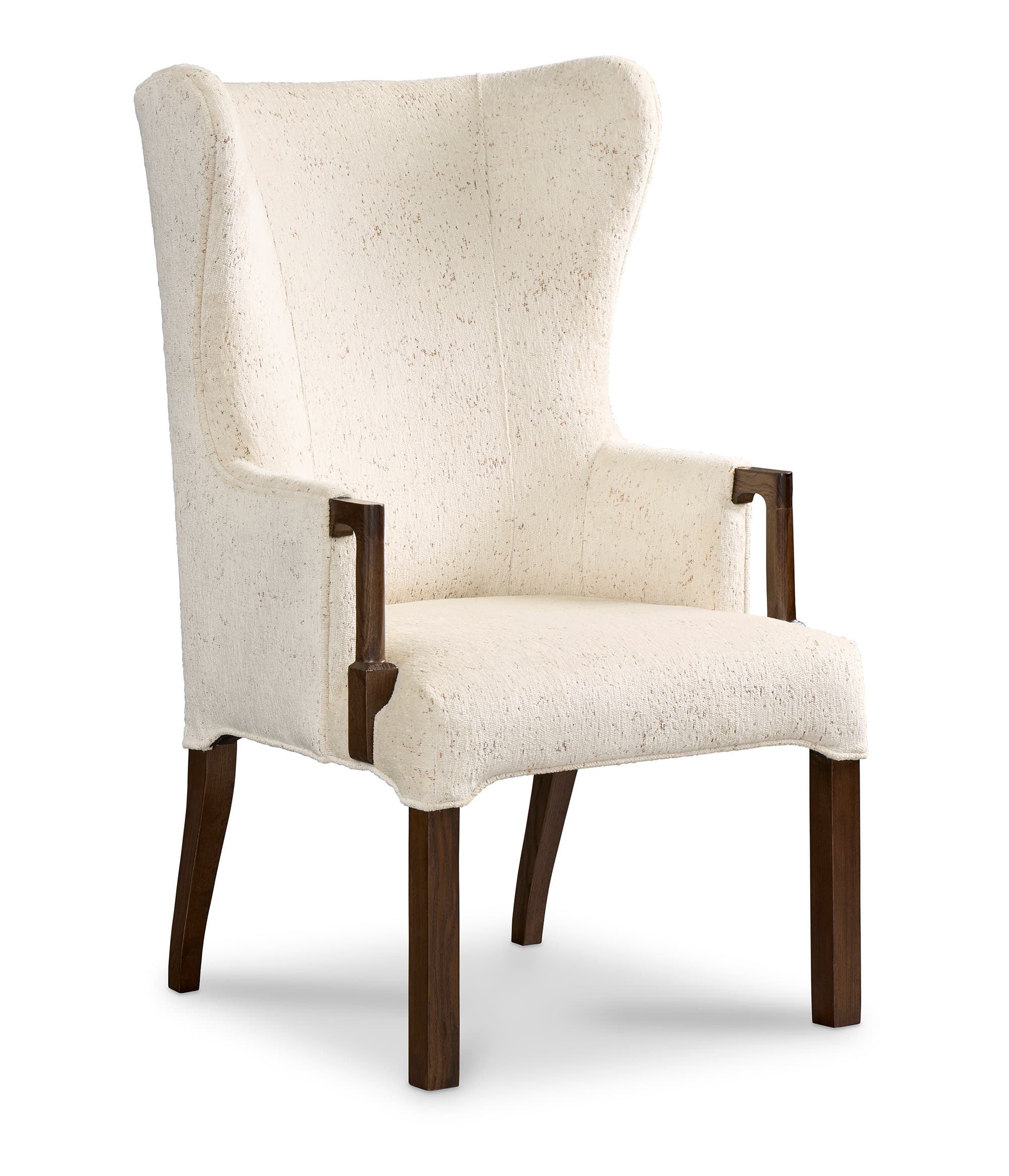 A cream-colored wingback chair with dark wood legs and armrest accents. The upholstery has a textured, speckled appearance. The chair features a high back that curves inward, providing a sense of enclosure, and upholstered armrests that flow into the back. The legs are straight and tapered, made of dark stained wood. There are also decorative dark wood elements integrated into the armrests. — 3D model