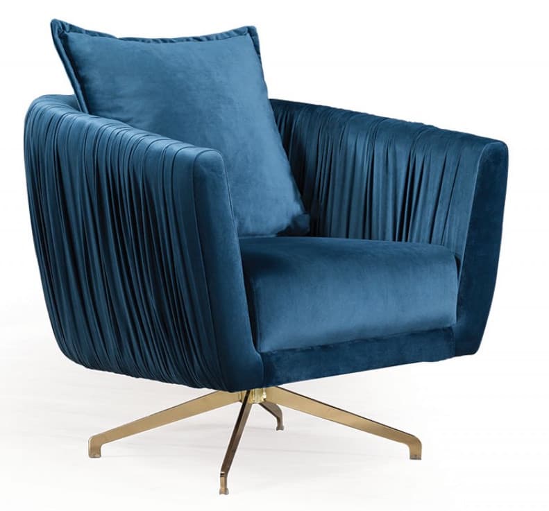 A plush armchair upholstered in deep blue velvet fabric. The sides and back of the chair feature a distinctive pleated or gathered design, creating a textured appearance. It is supported by a polished brass-finished four-star swivel base. A matching lumbar pillow is placed on the seat. — 3D model