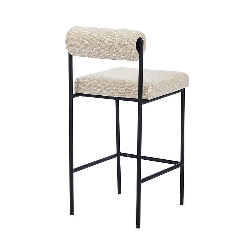 A modern bar stool with a black metal frame and a textured boucle fabric seat and backrest. The backrest is a rounded, low-profile design. The frame consists of four slender legs connected by crossbars for stability, typical of bar stool construction. — 3D model