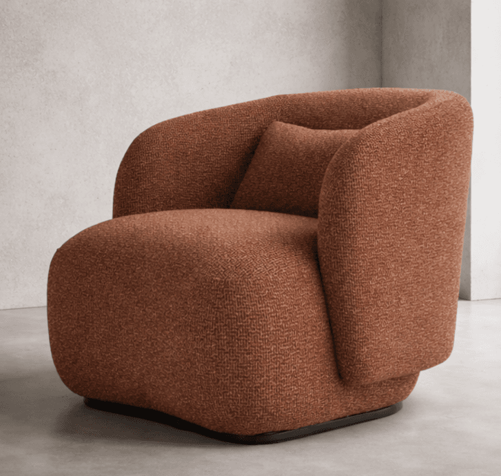 A plush, rounded, rust-colored upholstered lounge chair with a low profile and a recessed base, designed for comfort. — 3D model