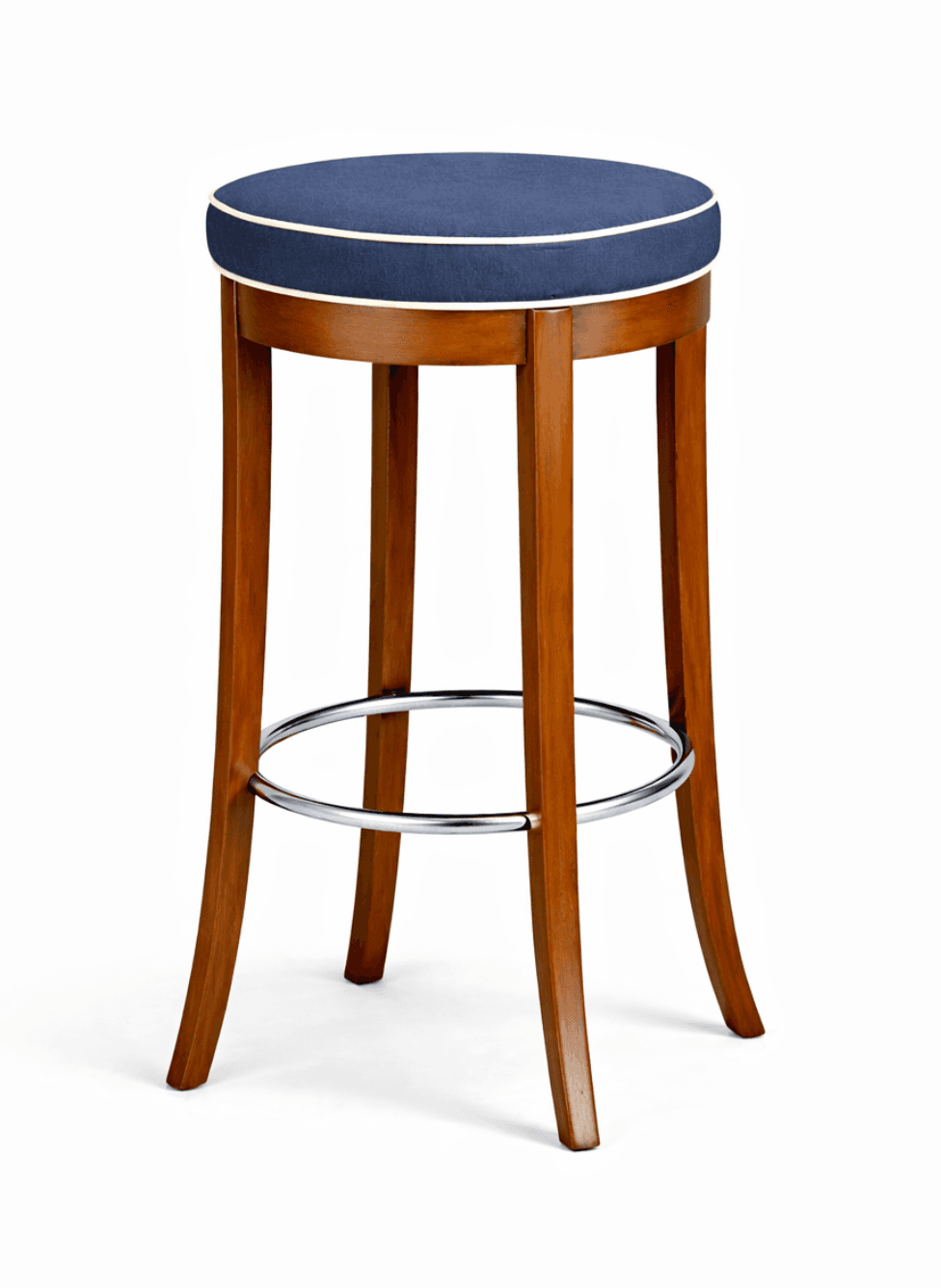 A round-top bar stool with a cushioned seat and a wooden frame. The seat is upholstered in dark blue fabric with white piping along the edge. The frame consists of four wooden legs connected by a circular chrome footrest. The legs are slightly curved outwards and are finished in a warm brown tone. — 3D model