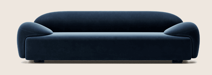 A deep blue, low-profile sofa with rounded arms and a continuous, flowing backrest. The sofa appears… — free GLTF 3D model